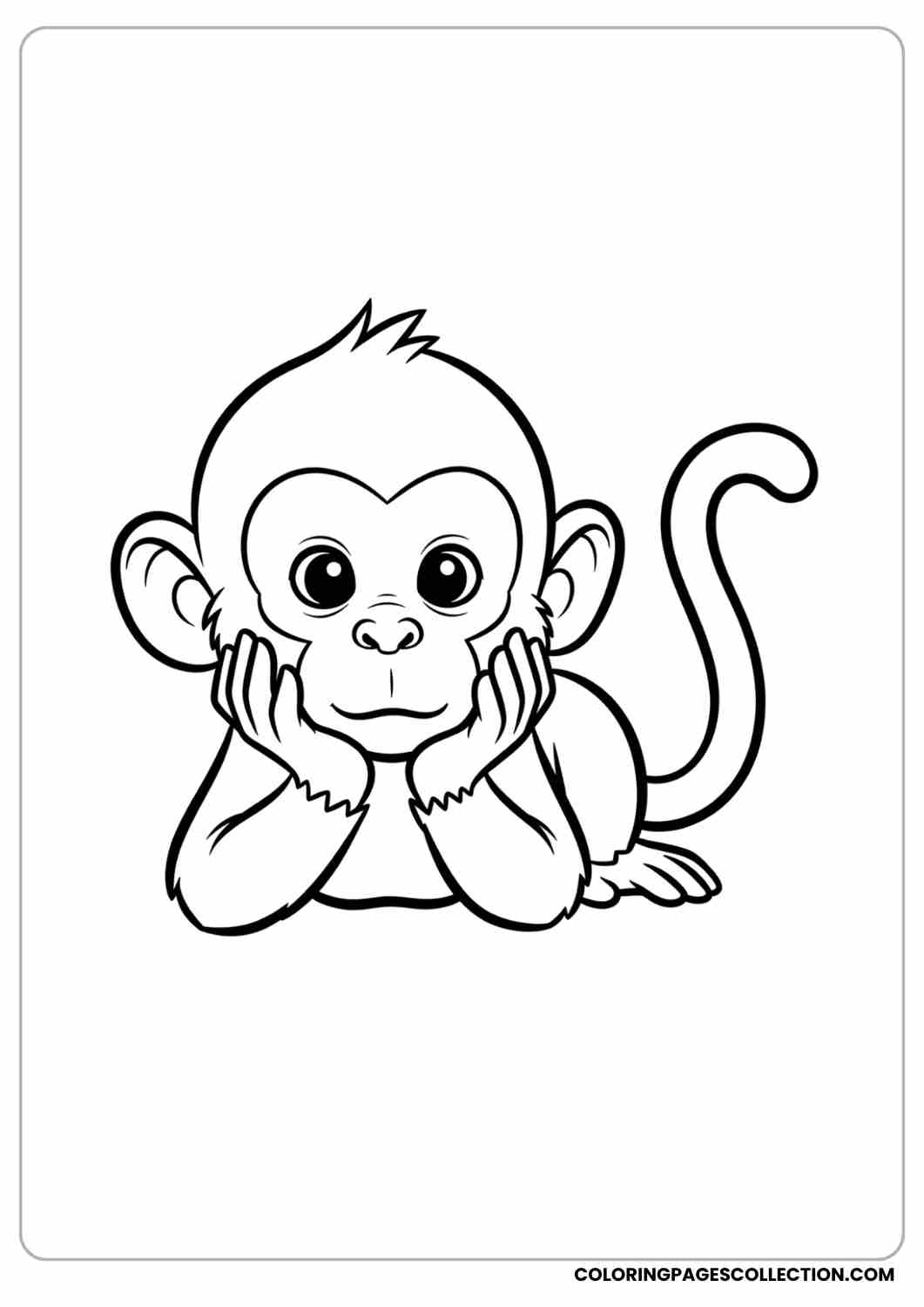 Baby monkey lying on its tummy, chin resting on hands.